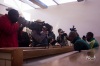 Media photographing and taking video of the accused