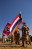 AWB Members in support of the Terre'Blanche Family with flags of the AWB and the old Transvaal Vierkleur.  The addition of the orange to the bottom of the flag denotes that they are ready for war.