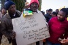 Supporters for the accused with their opinions on posters