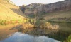 Interesting composition of upper lake at Kiara Lodge with water-feature.