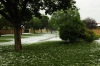 Even during a severe hailstorm this postman was delivering the mail.