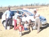children washing their sister's new car.