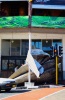Popular hipster hangout the Power &amp; the Glory is wrapped in roofing from a nearby building as strong winds lash Cape Town