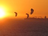 Kite surfing at sunset off Blouberg
