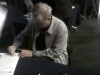 Garry Kasparov almost finished signing the boards.