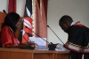Nakuru County Assembly Speaker Susan Kihika conversing with the county clerk during Thursday’s proceedings (Steve Wambugu, News24 Kenya)
