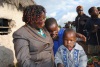 Joyce Chepkemoi with her 3 children. Her face was burnt in a boiling water during the skirmishes of 2007/08 but despite of all that,  she forgave those who disfigured her face and now all she wants is help to have facia plastic surgery in the USA. (Steve Wambugu, News24 user)