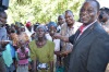 The Permanent Secretary Ministry of Special Programs Andrew Mondoh (stripped Kaunda), Nyando Member of Parliament, Fred Outa (stripped shirt) and Muhoroni MP, James K';oyoo being introduced to Mrs. Jane ‘Sirikal’ Aduka  the woman now synonymous with floods in Nyando for persistently calling on President, Uhuru Kenyatta, Former Prime Minister, Raila Odinga and Retired President, Mwai Kibaki to intervene every time her home gets flooded. She met the leaders when she went to collect her Relief food