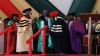 Dedan Kimathi University of Science and Technology senior staff dressing former President Kibaki with a gown when he was receiving a Honorary Doctorate Degree in Humane Letters (Litterarum Humanorum Doctor). Kibaki said education is one of the fastest ways to eradicate poverty. (Wangui Joseph, News24 user)