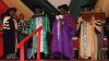 Dedan Kimathi University of Science and Technology senior staff dressing former President Kibaki with a gown when he was receiving a Honorary Doctorate Degree in Humane Letters (Litterarum Humanorum Doctor). Kibaki said education is one of the fastest ways to eradicate poverty. (Wangui Joseph, News24 user)