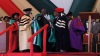 Dedan Kimathi University of Science and Technology senior staff dressing former President Kibaki with a gown when he was receiving a Honorary Doctorate Degree in Humane Letters (Litterarum Humanorum Doctor). Kibaki said education is one of the fastest ways to eradicate poverty. (Wangui Joseph, News24 user)