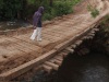 A man crosses a risky wooden bridge at Nturukuma village in Laikipia. The bridge posses great danger to the area residents. Goods from Nanyuki cannot reach the area residents due to poor road infrastructure. (James Kabotia, News24 user)