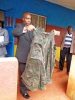 Police display some of the military attires recovered after four suspected gangsters were arrested in Nyeri. (James Kabotia, News24 user)