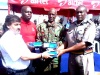Khetia's group of companies operational manger Ashoc Khetia (left), Airtel Western region manager Anthony Opiyo, Kitale OCS Bonaya Galgalo and kitale OCPD Kimani Mitugo at Kitale police station where ten toll free mobile phones were donated to the force by Airtel and khetia's group of companies to help beef up security during and after elections. The program will cost KES 0.5 Million. More gadgets will be delivered later. (Mwangi Karanja, News24 user)