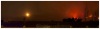 Moon rising over mountain on fire - 10pm