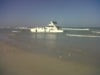 boat is busy to sink at struisbaai, western cape after breaking away from habour. Owners and public trying to safe the boat but find it difficult.