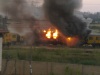 Yesterday at around 6 pm, I was on my way home from the bus stop when I looked at across at train in motion and saw one carriage burst into flames, about 200 meters before New Canada station. The flames were as high as 10 metres in the sky. As to whether any person got injured I don't know because the driver of the train stopped the train and everybody jumped out and some walked towards the station. One guy from the station came and tried to set the other carriages free from the burning one.