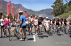 Branson, supported by old and new generation of Virgin Angles at the top of the last arduous climb of the cape Argus Cycle Tour, Suikerbossie.