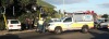 The white golf on the left jumped a red light on the wrong side of the road and had a head on with a silver Yaris on the right of the emergency vehicle.
