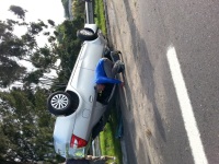 Car overturned on the M5. Driver seems to be alive but they would need to flip the car or cut him out.  (Aneeqah Emeran, News24)