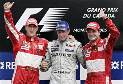 Canadian Grand Prix winner Kimi Raikkonen celebrates with Michael Schumacher and Rubens Barrichello. (Paul Chiasson, AP)