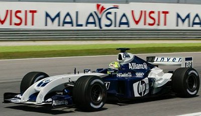 Ralf Schumacher drives his BMW Williams at the Sepang International Circuit on Friday, March 19, as he practices for Sunday's Malaysian Grand Prix F1 race. (Vincent Thian, AP) 