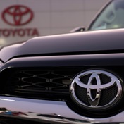Toyota apologises for scandals as vehicle sales set new record