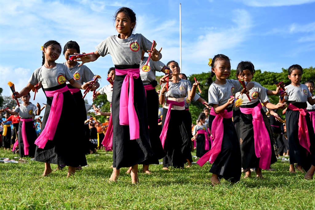 A group of children perform a traditional Balinese
