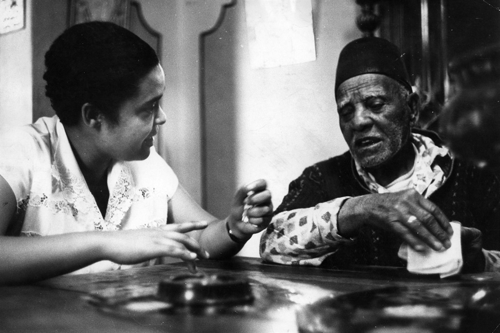 1960s: Bessie Head the journalist interviews a fortune teller. (Photograph by Drum Photographer/Baileys Archives/Africa Media Online)

