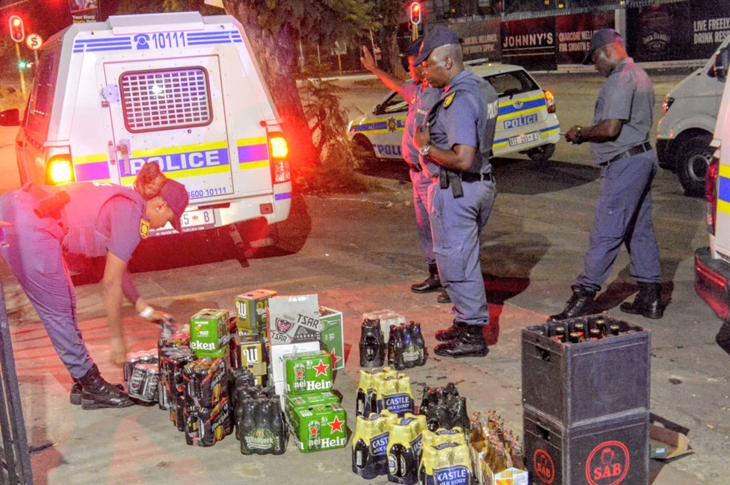 Police confiscated liquor from a shebeen in the Pretoria CBD on 31 December 2023. Photo by Raymond Morare
