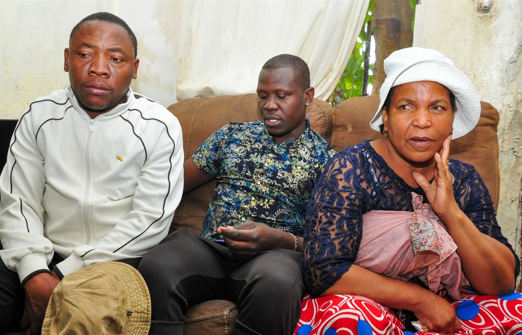 From left: Madabane Zwane, Kabelo Mare and Shelly Mucacha who are the relatives of the dead Petrus Nare. Photo by Rapula Mancai