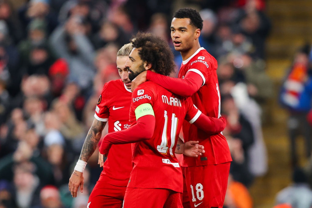 LIVERPOOL, ENGLAND - NOVEMBER 30: Cody Gakpo of Liverpool celebrates with Mohamed Salah after scoring his sides second goal during the UEFA Europa League match between Liverpool and LASK at Anfield on November 30, 2023 in Liverpool, England. (Photo by James Gill - Danehouse/Getty Images)
