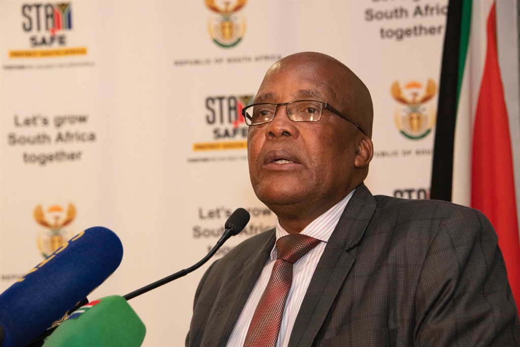 Home Affairs Minister Dr Aaron Motsoaledi briefing the media in Tshwane on Friday. 