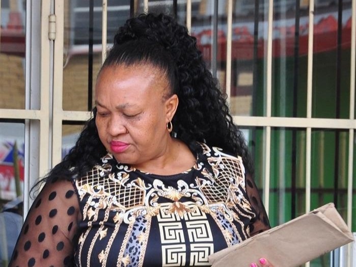 Betty Diale outside the  Specialised Commercial Crimes Court sitting in Rustenburg. Photo by Rapula Mancai