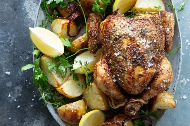 Portuguese chicken with roast potatoes. (Photo: Misha Jordaan)
