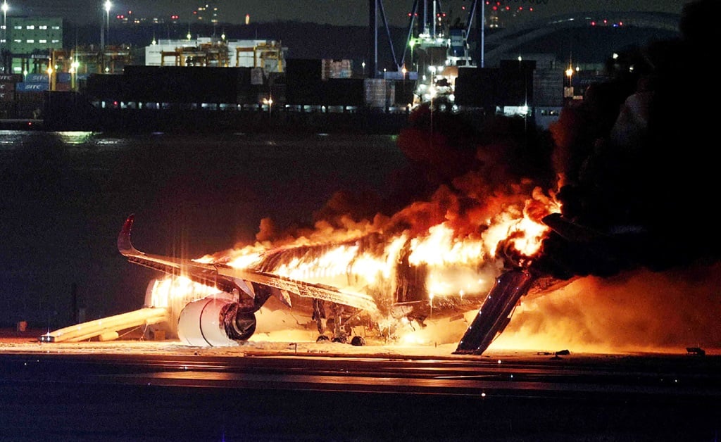 A Japan Airlines plane was in flames on the runway