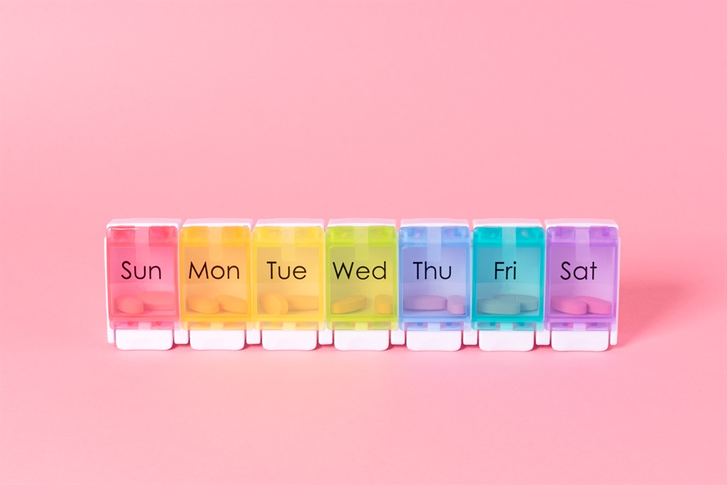 Multi coloured weekly pill organiser.
