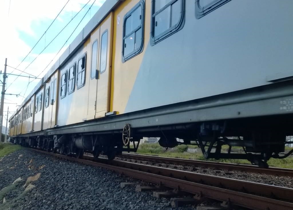 The train was moving between Steenberg Station and Fish Hoek Station when a group of youths stoned it.