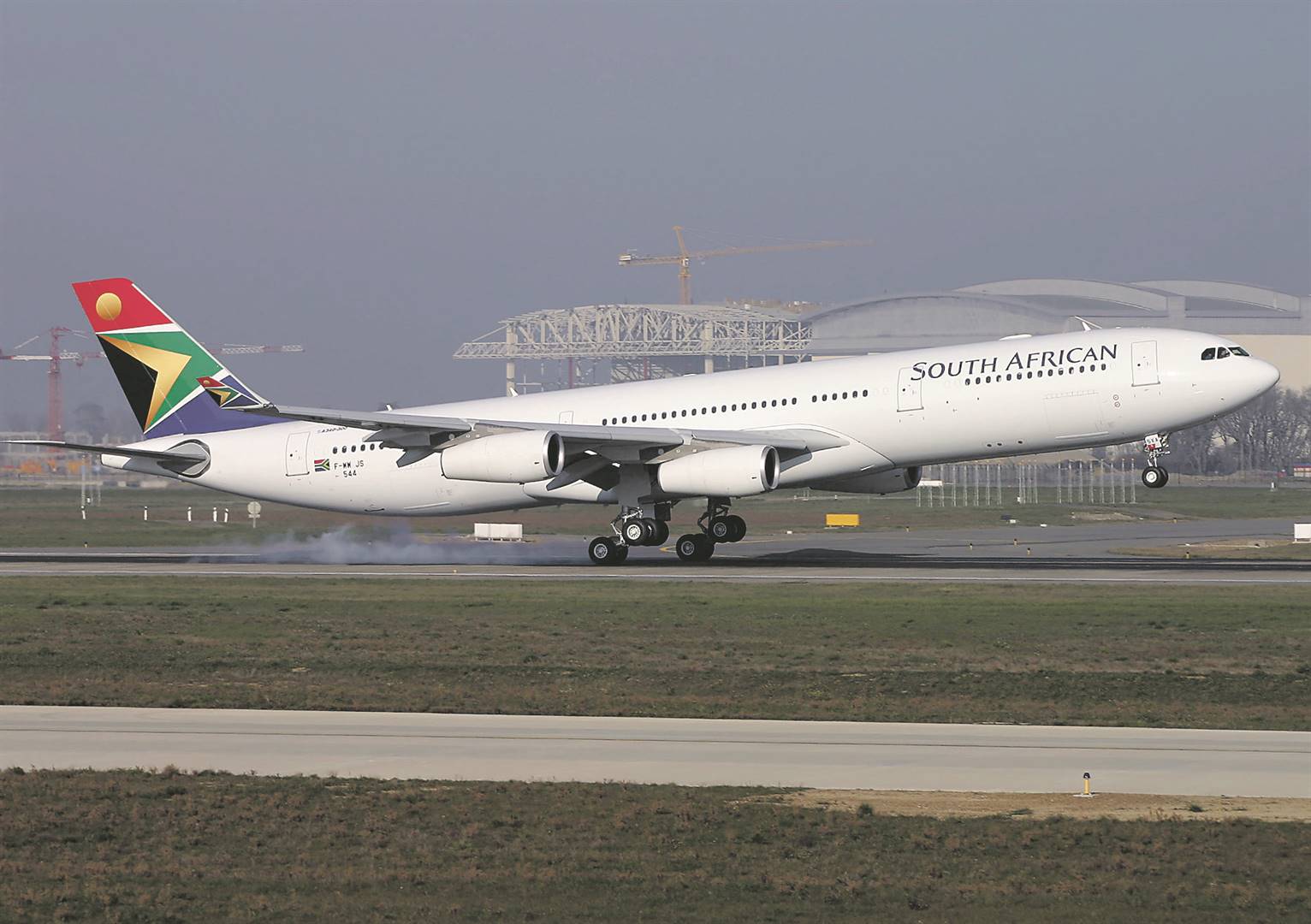 An SAA Airbus A340 lands at OR Tambo International Airport. 