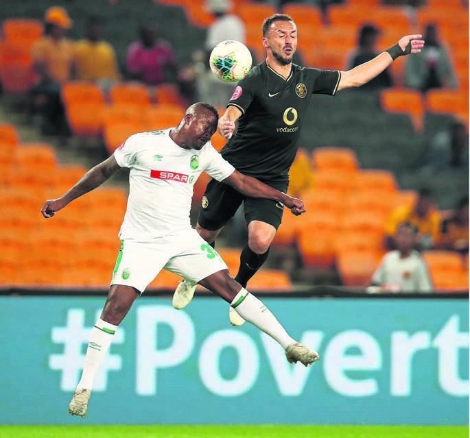 Kaizer Chiefs’ Samir Nurkovic is challenged by AmaZulu’s Tsepo Masilela during their Absa Premiership match at FNB Stadium last night. Picture: Muzi Ntombela / BackpagePix