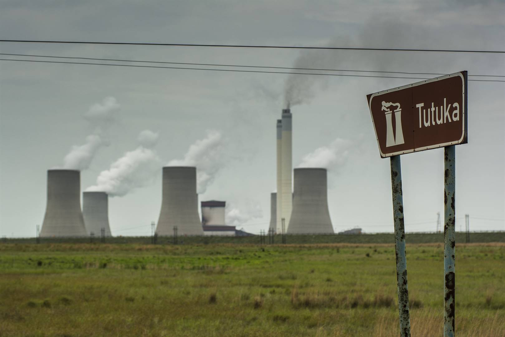 Emissions rise from the cooling towers of the Eskom's Tutuka coal-fired power station in Mpumalanga. Photographer: Waldo Swiegers/Bloomberg via Getty Images Photo by 