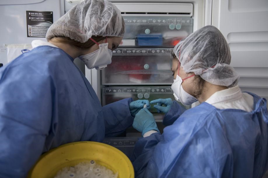 Researchers place test material inside the laborat