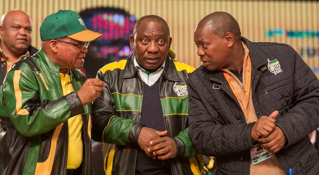 Former President Jacob Zuma, President Cyril Ramaphosa and Helath Minister Zweli Mkhize during the African National Congress (ANC) 5th national policy conference at the Nasrec Expo Centre in 2017. (Photo by Gallo Images / Beeld / Deaan Vivier)