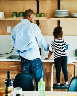 Dad and child in kitchen