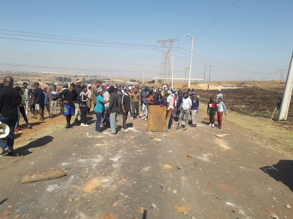 The scene as Rietvallei residents clashed with the police over land invasion. 