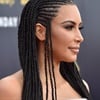 Kim Kardashian criticised for dressing dark-skinned model in black face mask for 'nude' SKIMS promo