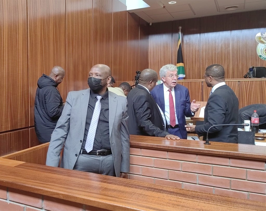 University of Fort Hare head of investigation and vetting Isaac Plaatjies (in front) during his bail hearing at Dimbaza Magistrate's Court.