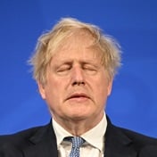 Boris Johnson apologises to UK Covid victims' families – but defends his record