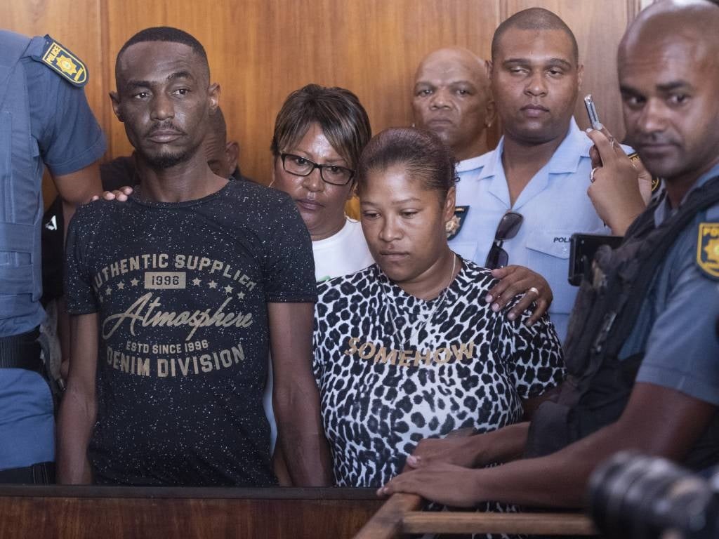 Family members of Tazne van Wyk sit in court