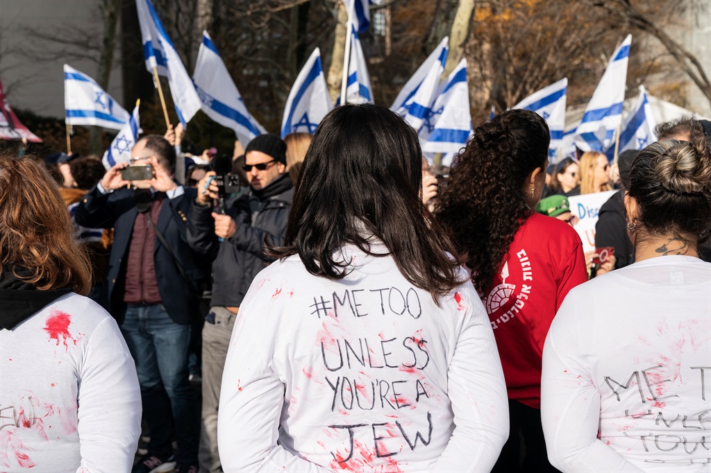 Activists in New York protest in support of Israeli women allegedly sexually assaulted during the Hamas attack on 7 October. (Photo by Lev Radin/VIEWpress)